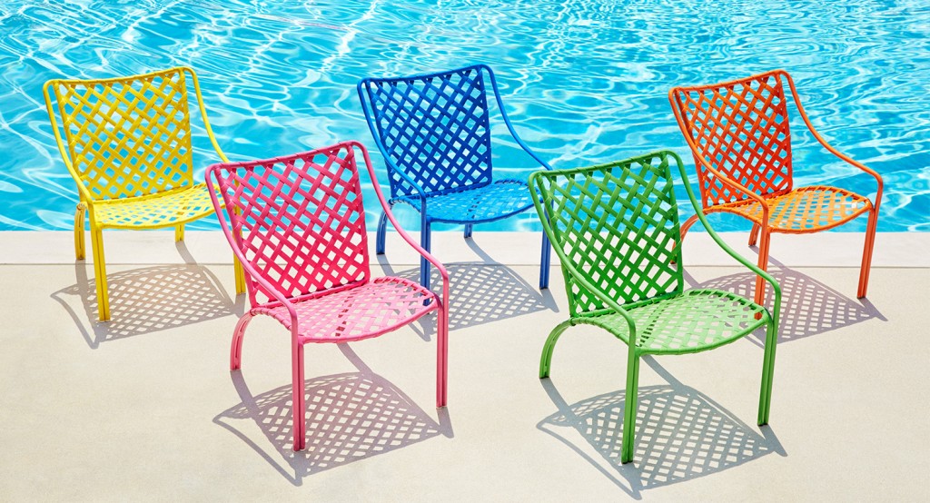 Colored chairs by a pool